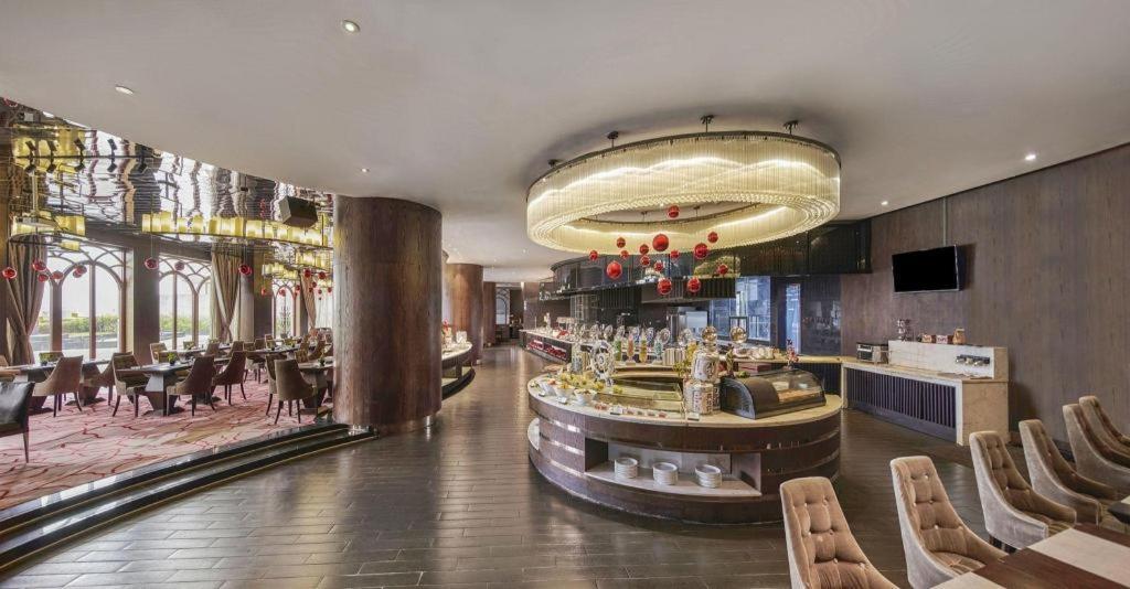 Maison New Century Hotel Dongguan Dongguan  Buitenkant foto